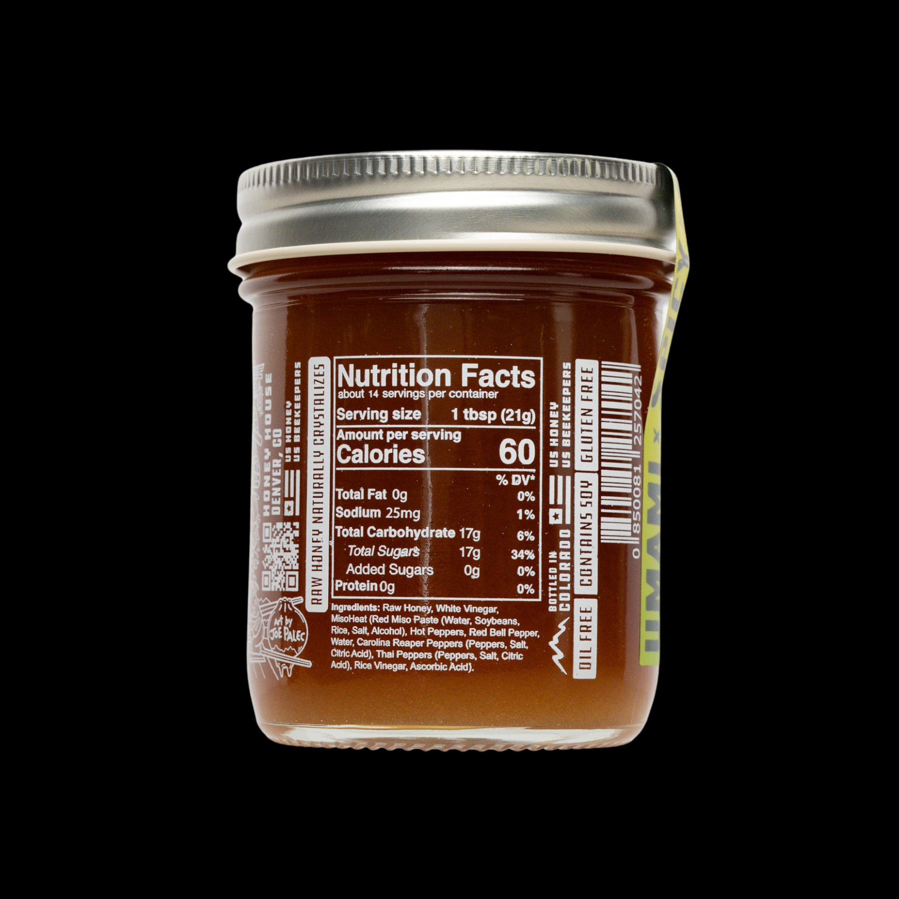Jar of honey with nutrition facts label on a black background