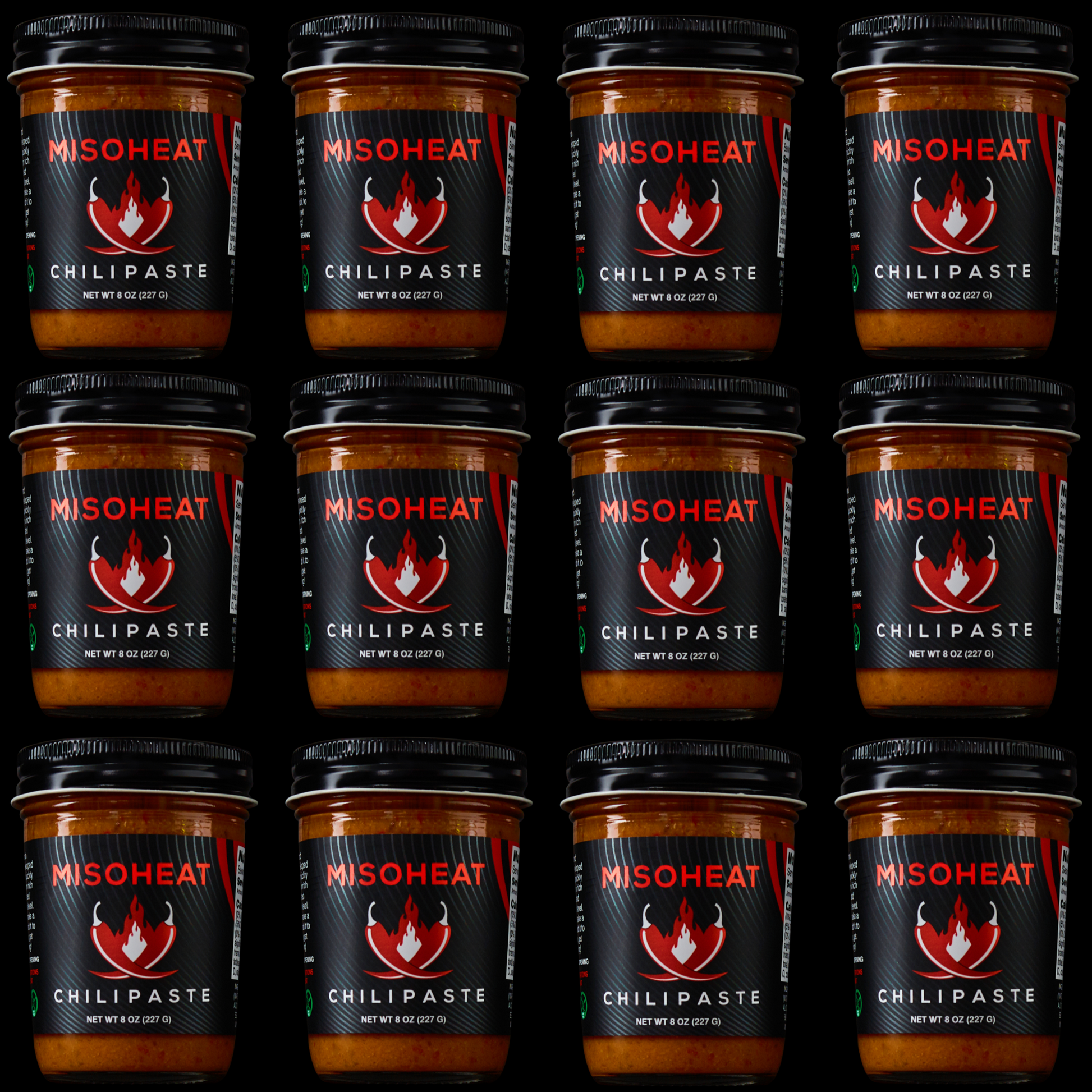 Twelve (12) jars of MisoHeat Chili Paste 8z stacked to represent a case of MisoHeat